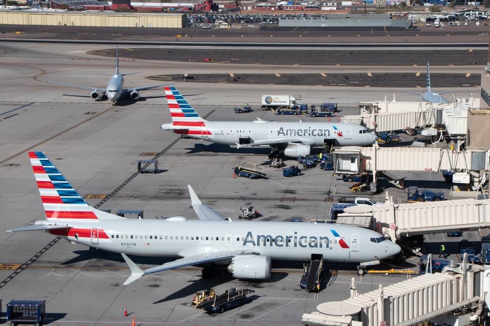 Two American Airlines planes waiting for passengers to board